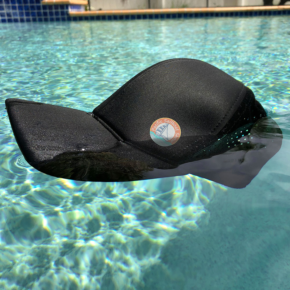 Baseball cap floating in a pool