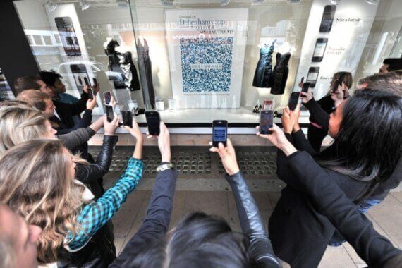 QR code being scanned by a group of people