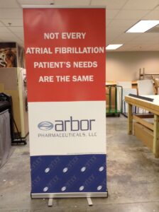 Retractable banner stand